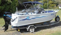 Australian Wheel Clamp securing Ally Craft Boat and Trailer