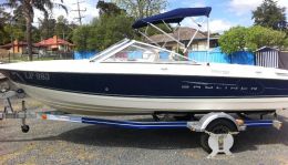 Australian Wheel Clamp securing Bayliner Boat and Trailer Discovery 195 Bowrider 2008