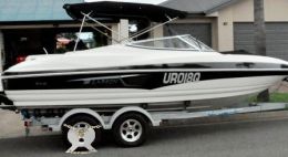 Australian Wheel Clamp securing Larson Boat and Trailer Senza 206 Bowrider 2011