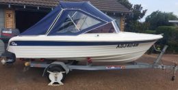 Australian Wheel Clamp securing Ultimate Boat and Trailer 5m 1992