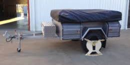 Australian Wheel Clamp securing Altitude Campers Highlander