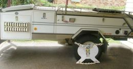 Australian Wheel Clamp securing Aussie Swag Campers Rover
