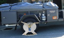 Australian Wheel Clamp securing Follow Me Campers Ord Explorer