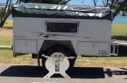 Australian Wheel Clamp securing Wandering Star Trailers Bushmaster camper trailer