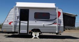 Australian Wheel Clamp securing Coronet Caravans Extenda